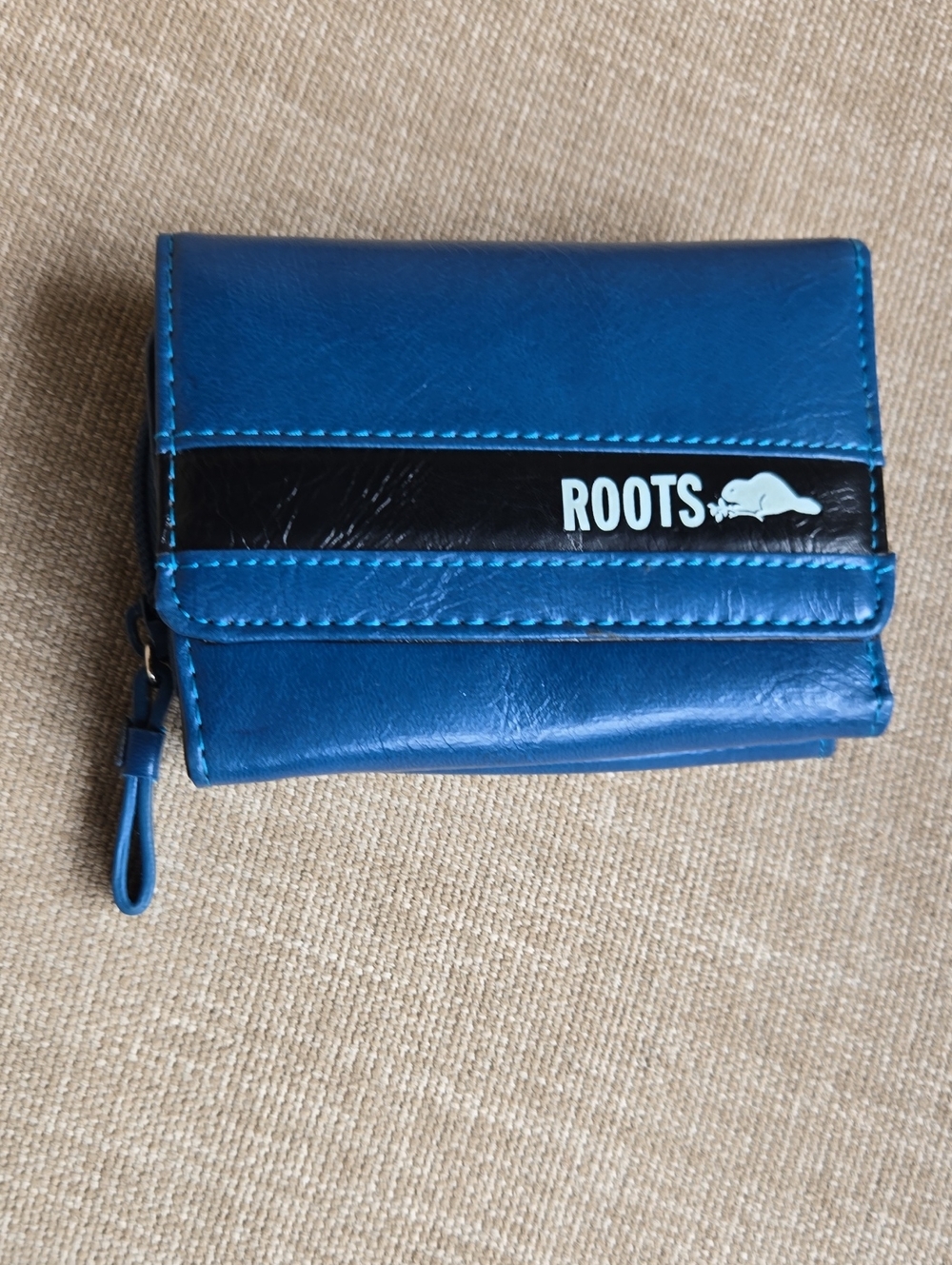 Roots Blue Leather Compact Wallet with Black Logo Stripe